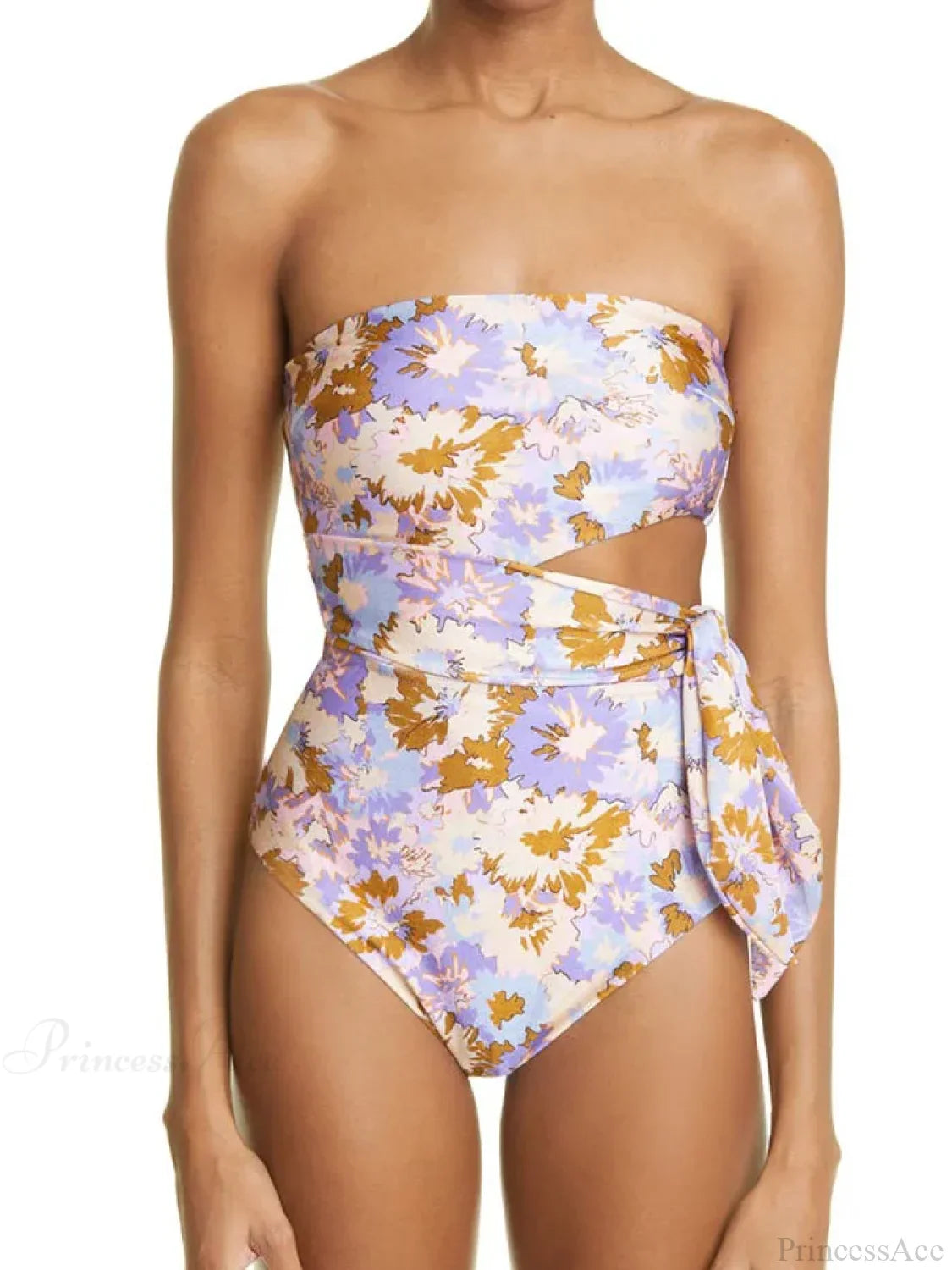 Traje de baño de una pieza con estampado floral morado y amarillo y escote cruzado